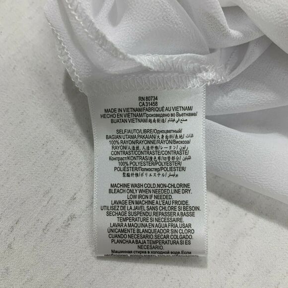 BCBGeneration Optic White Tunic Top Size XS Contrast Sheer Hem Double Slit - Picture 7 of 10